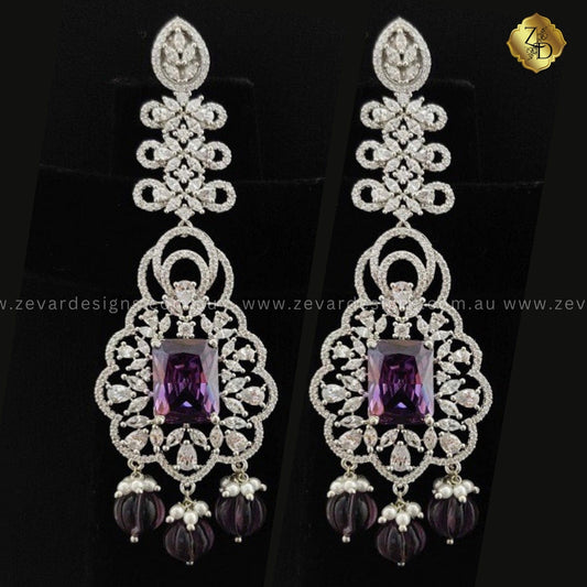 Zevar Designs Indo-Western Earrings Amethyst (Violet) AD Earrings