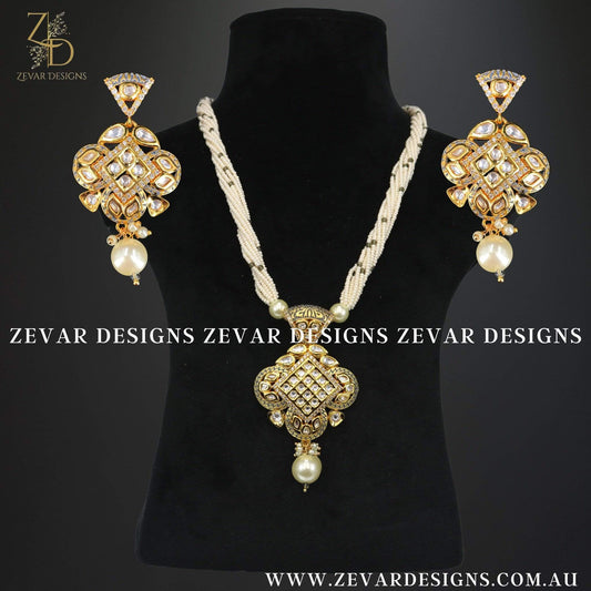 Zevar Designs Kundan Long Set Kundan Pendant Set in Pearl and Grey Meena